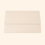 Beige clutch bag on a beige background