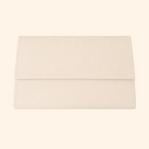 Beige clutch bag on a beige background