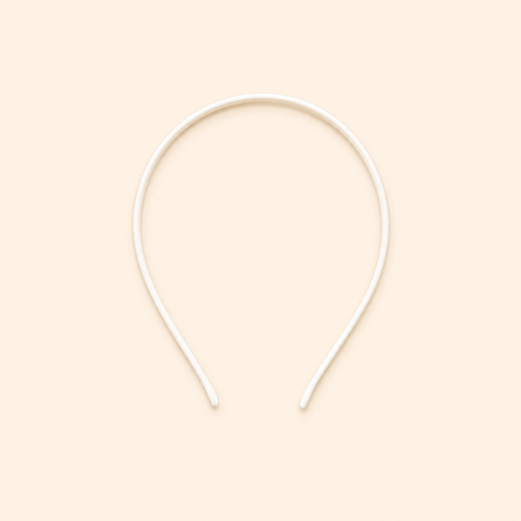 White headband on a beige background